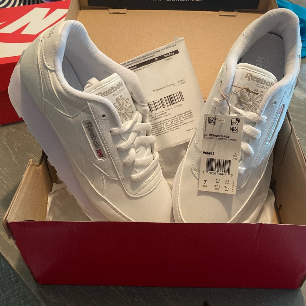 Brand new with tags womens white reebok sneakers, size 7.